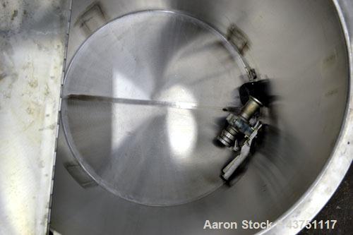 Used Water Cooling Corporation Tank, 60 Gallons, 304 Stainless Steel, Vertical. Approximately 30-1/2" diameter x 21" straight side.  Flat top with a bolt-on hinged cover, 6" sloped bottom.  2" Tri-cl...