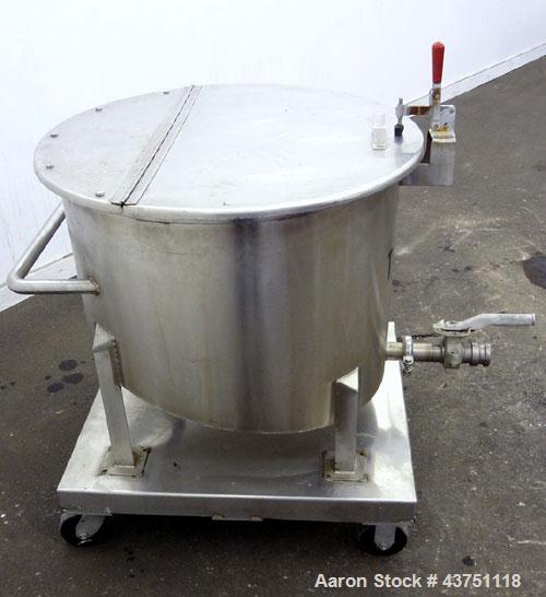 Used Water Cooling Corporation Tank, 60 Gallons, 304 Stainless Steel, Vertical. Approximately 30-1/2" diameter x 21" straight side.  Flat top with a bolt-on hinged cover, 6" sloped bottom.  2" Tri-cl...