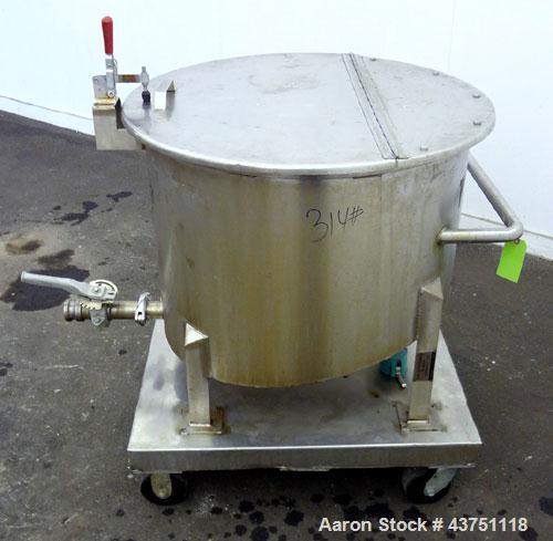 Used Water Cooling Corporation Tank, 60 Gallons, 304 Stainless Steel, Vertical. Approximately 30-1/2" diameter x 21" straight side.  Flat top with a bolt-on hinged cover, 6" sloped bottom.  2" Tri-cl...