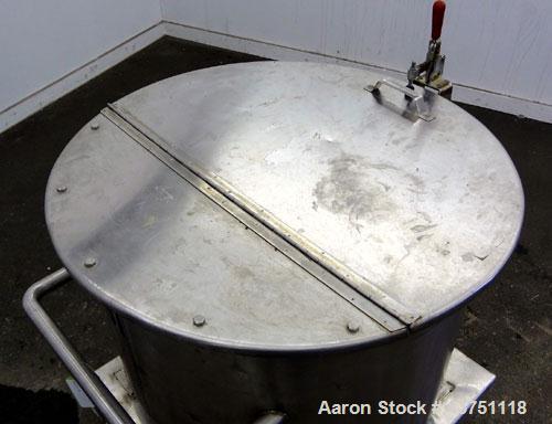 Used Water Cooling Corporation Tank, 60 Gallons, 304 Stainless Steel, Vertical. Approximately 30-1/2" diameter x 21" straight side.  Flat top with a bolt-on hinged cover, 6" sloped bottom.  2" Tri-cl...