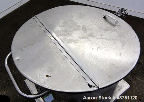 Used Water Cooling Corporation Tank, 60 Gallons, 304 Stainless Steel, Vertical. Approximately 30-1/2" diameter x 21" straight side.  Flat top with a bolt-on hinged cover, 6" sloped bottom.  2" Tri-cl...