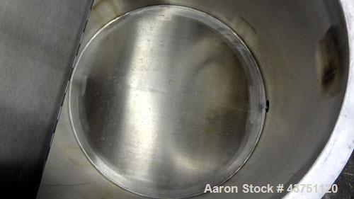 Used Water Cooling Corporation Tank, 60 Gallons, 304 Stainless Steel, Vertical. Approximately 30-1/2" diameter x 21" straight side.  Flat top with a bolt-on hinged cover, 6" sloped bottom.  2" Tri-cl...