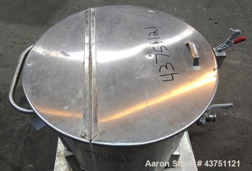 Used Water Cooling Corporation Tank, 60 Gallons, 304 Stainless Steel, Vertical. Approximately 30-1/2" diameter x 21" straight side.  Flat top with a bolt-on hinged cover, 6" sloped bottom.  2" Tri-cl...
