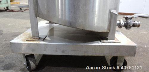 Used Water Cooling Corporation Tank, 60 Gallons, 304 Stainless Steel, Vertical. Approximately 30-1/2" diameter x 21" straight side.  Flat top with a bolt-on hinged cover, 6" sloped bottom.  2" Tri-cl...