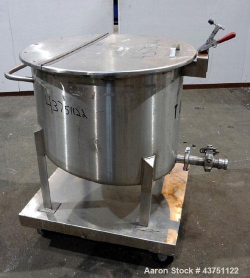 Used Water Cooling Corporation Tank, 60 Gallons, 304 Stainless Steel, Vertical. Approximately 30-1/2" diameter x 21" straight side.  Flat top with a bolt-on hinged cover, 6" sloped bottom.  2" Tri-cl...