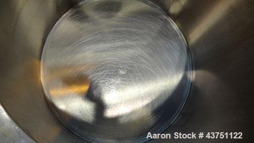 Used Water Cooling Corporation Tank, 60 Gallons, 304 Stainless Steel, Vertical. Approximately 30-1/2" diameter x 21" straight side.  Flat top with a bolt-on hinged cover, 6" sloped bottom.  2" Tri-cl...