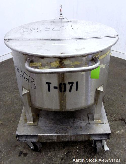 Used Water Cooling Corporation Tank, 60 Gallons, 304 Stainless Steel, Vertical. Approximately 30-1/2" diameter x 21" straight side.  Flat top with a bolt-on hinged cover, 6" sloped bottom.  2" Tri-cl...
