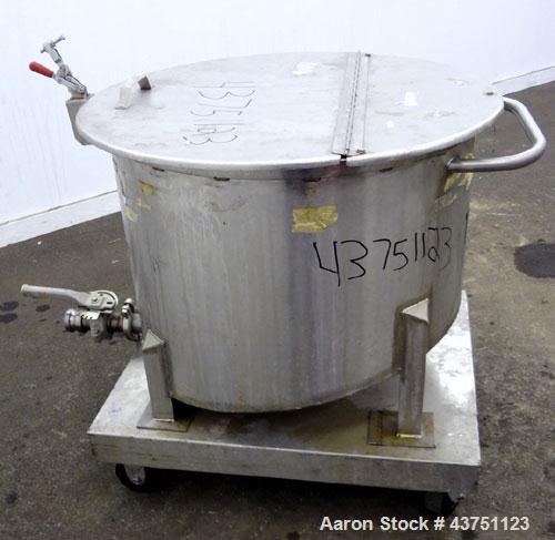 Used Water Cooling Corporation Tank, 60 Gallons, 304 Stainless Steel, Vertical. Approximately 30-1/2" diameter x 21" straight side.  Flat top with a bolt-on hinged cover, 6" sloped bottom.  2" Tri-cl...