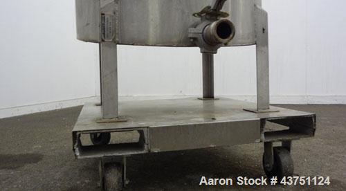 Used Water Cooling Corporation Tank, 60 Gallons, 304 Stainless Steel, Vertical. Approximately 30-1/2" diameter x 21" straight side.  Flat top with a bolt-on hinged cover, 6" sloped bottom.  2" Tri-cl...
