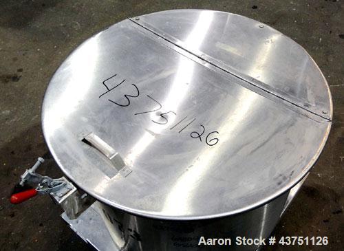 Used Water Cooling Corporation Tank, 60 Gallons, 304 Stainless Steel, Vertical. Approximately 30-1/2" diameter x 21" straight side.Flat top with a bolt-on hinged cover, 6" sloped bottom.2" Tri-clamp ...