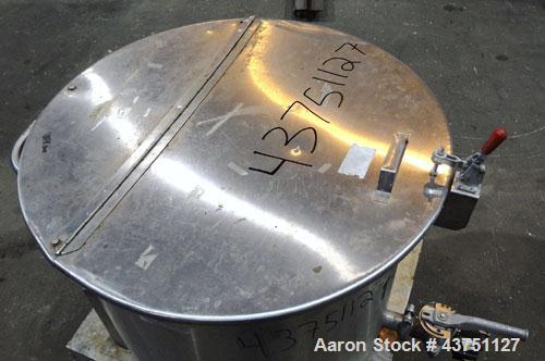 Used Water Cooling Corporation Tank, 60 Gallons, 304 Stainless Steel, Vertical. Approximately 30-1/2" diameter x 21" straight side.  Flat top with a bolt-on hinged cover, 6" sloped bottom.  2" Tri-cl...