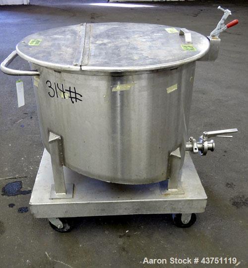 Used Water Cooling Corporation Tank, 60 Gallons, 304 Stainless Steel, Vertical. Approximately 30-1/2" diameter x 21" straight side.  Flat top with a bolt-on hinged cover, 6" sloped bottom.  2" Tri-cl...