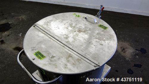 Used Water Cooling Corporation Tank, 60 Gallons, 304 Stainless Steel, Vertical. Approximately 30-1/2" diameter x 21" straight side.  Flat top with a bolt-on hinged cover, 6" sloped bottom.  2" Tri-cl...