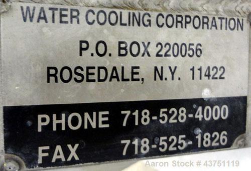 Used Water Cooling Corporation Tank, 60 Gallons, 304 Stainless Steel, Vertical. Approximately 30-1/2" diameter x 21" straight side.  Flat top with a bolt-on hinged cover, 6" sloped bottom.  2" Tri-cl...