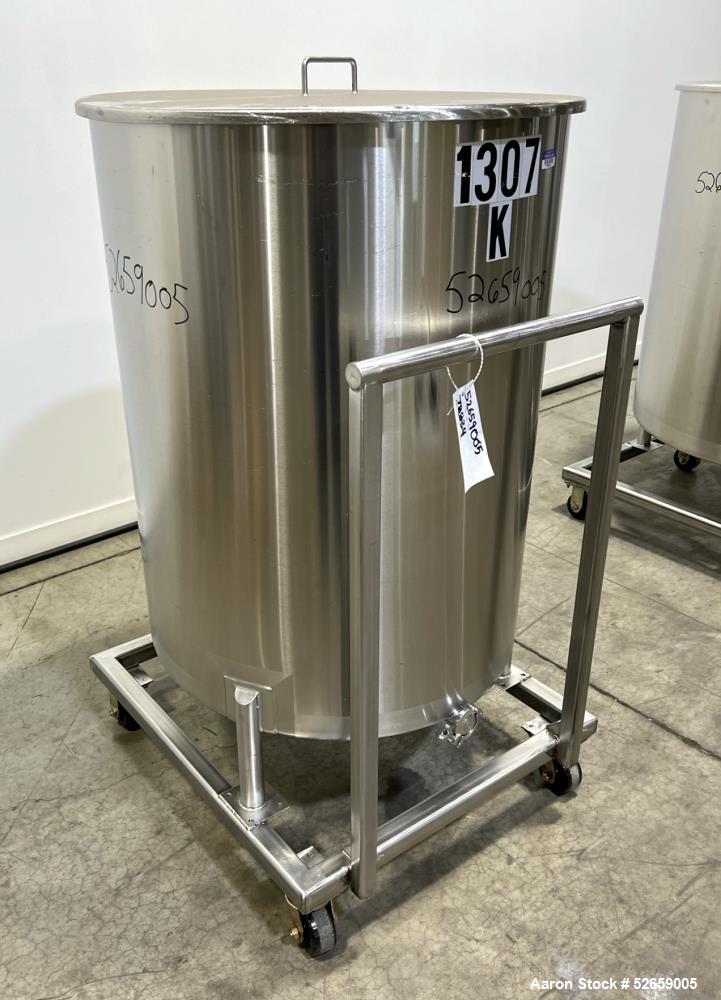 Used Stainless Steel Tank, Approximate 140 Gallon, Vertical. Approximate 32" diameter x 40" straight side. Flat top with cover, slight sloped bottom. 1-1/2" side bottom outlet, 13" discharge height. ...