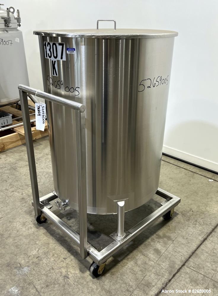 Used Stainless Steel Tank, Approximate 140 Gallon, Vertical. Approximate 32" diameter x 40" straight side. Flat top with cover, slight sloped bottom. 1-1/2" side bottom outlet, 13" discharge height. ...