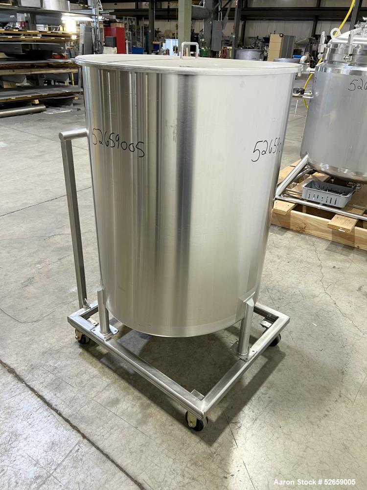Used Stainless Steel Tank, Approximate 140 Gallon, Vertical. Approximate 32" diameter x 40" straight side. Flat top with cover, slight sloped bottom. 1-1/2" side bottom outlet, 13" discharge height. ...