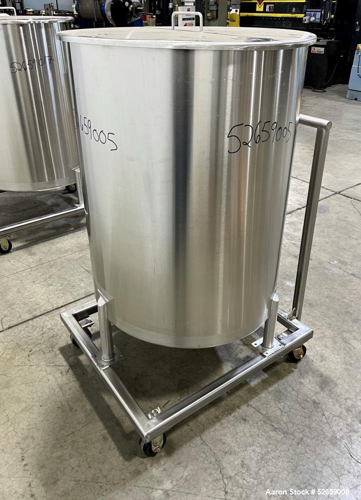Used- Stainless Steel Tank, Approximate 140 Gallon, Vertical. Approximate 32" diameter x 40" straight side. Flat top with co...