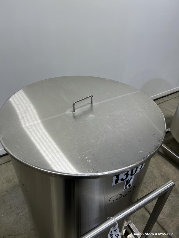 Used Stainless Steel Tank, Approximate 140 Gallon, Vertical. Approximate 32" diameter x 40" straight side. Flat top with cover, slight sloped bottom. 1-1/2" side bottom outlet, 13" discharge height. ...