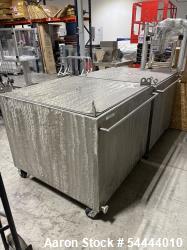 Used Square Tank, Approximately 450 gallon. Stainless steel, with Internal Sieve. Approximately 4' x 4' x 4', Top Cover.