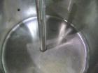 Used 300 Gallon stainless steel single wall open top tank. Has stainless steel hip sockets. Has center bottom outlet.