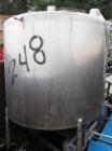 Used Tank, approximately 500 gallon, stainless steel, vertical.