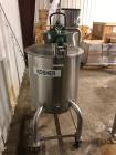 Used Permasan 44 Gallon SIngle Wall Stainless Steel Tank with Lightnin Mixer Modes XDA33. Mounted on casters with bottom valve.