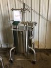 Used Permasan 44 Gallon SIngle Wall Stainless Steel Tank with Lightnin Mixer Modes XDA33. Mounted on casters with bottom valve.