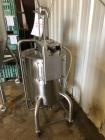 Used Permasan 44 Gallon SIngle Wall Stainless Steel Tank with Lightnin Mixer Modes XDA33. Mounted on casters with bottom valve.