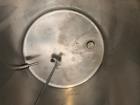 Used Permasan 44 Gallon SIngle Wall Stainless Steel Tank with Lightnin Mixer Modes XDA33. Mounted on casters with bottom valve.