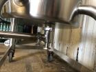 Used Permasan 44 Gallon SIngle Wall Stainless Steel Tank with Lightnin Mixer Modes XDA33. Mounted on casters with bottom valve.