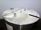 Used Tank, Approximately 250 Gallon, 316 Stainless Steel, Vertical. Flat top with a 1/3 hinged top cover, slight coned bottom. Provision for clamp on agitator (no agitator). Openings top (2) 1-1/2