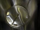 Used Tank, Approximately 250 Gallon, 316 Stainless Steel, Vertical. Flat top with a 1/3 hinged top cover, slight coned bottom. Provision for clamp on agitator (no agitator). Openings top (2) 1-1/2