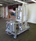 Used Portable Tank System. Consisting of approximately 150 gallon tank