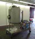 Used Portable Tank System. Consisting of approximately 150 gallon tank