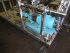 Used Portable Tank System. Consisting of approximately 150 gallon tank