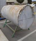 Used Tank, Approximate 300 Gallon, Stainless Steel, Horizontal. Approximate 36” diameter x 60” straight side, dished heads. Mounted on a carbon steel legs.