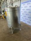 Used- Stainless Steel Tank, Approximate 100 Gallon, Stainless Steel, Vertical. Flat top, pitched bottom. Bottom outlet. Moun...