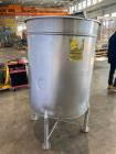 Used- Stainless Steel Tank, Approximate 100 Gallon, Stainless Steel, Vertical. Flat top, pitched bottom. Bottom outlet. Moun...