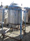 Used Allcraft Pressure Tank, 50 Gallon, Stainless steel, Vertical. 24'' diameter x 24'' straight side, dished top and bottom. Internal rated 50 psi at 300 deg F. Top manway, center bottom outlet. Mou...