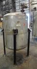 Used Alloy Fab Pressure Tank, 300 Gallons, 316L Stainless Steel, Vertical.  42” Diameter x 47” straight side, dish top and bottom.  Internal rated 60 psi/full vacuum at 100 degrees F.  Openings:  top...