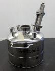Used Alloy Products Pressure Tank, 2 Gallon, 316L Stainless Steel, Vertical. 12” Diameter x 4” straight side. Dished top and bottom. Internal rated 125 psi at -20 to 100 degrees F. Off center top ent...