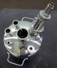 Used Alloy Products Pressure Tank, 2 Gallon, 316L Stainless Steel, Vertical. 12” Diameter x 4” straight side. Dished top and bottom. Internal rated 125 psi at -20 to 100 degrees F. Off center top ent...