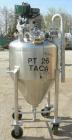 Used B & G Pressure Tank, 75 Gallon, 316 Stainless Steel, Vertical. Approximately 32
