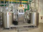 Used DCI 200 Gallon stainless steel, hot water jacketed, process tank with Lightnin mixer.