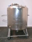 Used DCI Pressure Tank, 211.34 Gallon, 316 Stainless Steel, Vertical. 43-1/4’’ Diameter x 37’’ straight side, dished top and bottom. Internal rated 50 psi at 300 degrees F. Openings: top 16’’ manway ...