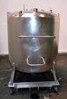 Used DCI Pressure Tank, 211.34 Gallon, 316 Stainless Steel, Vertical. 43-1/4’’ Diameter x 37’’ straight side, dished top and bottom. Internal rated 50 psi at 300 degrees F. Openings: top 16’’ manway,...