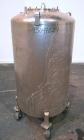 Used DCI Pressure Tank, 150 Gallon, 316L Stainless Steel, Vertical. 30’’ Diameter x 44’’ straight side, dished top and bottom. Internal rated 25 psi at 200 degrees F. Openings: top 12’’ manway with c...