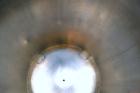 Used DCI Pressure Tank, 150 Gallon, 316L Stainless Steel, Vertical. 30’’ Diameter x 44’’ straight side, dished top and bottom. Internal rated 25 psi at 200 degrees F. Openings: top 12’’ manway with c...