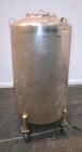 Used DCI Pressure Tank, 150 Gallon, 316L Stainless Steel, Vertical. 30’’ Diameter x 44’’ straight side, dished top and bottom. Internal rated 25 psi at 200 degrees F. Openings: top 12’’ manway with c...